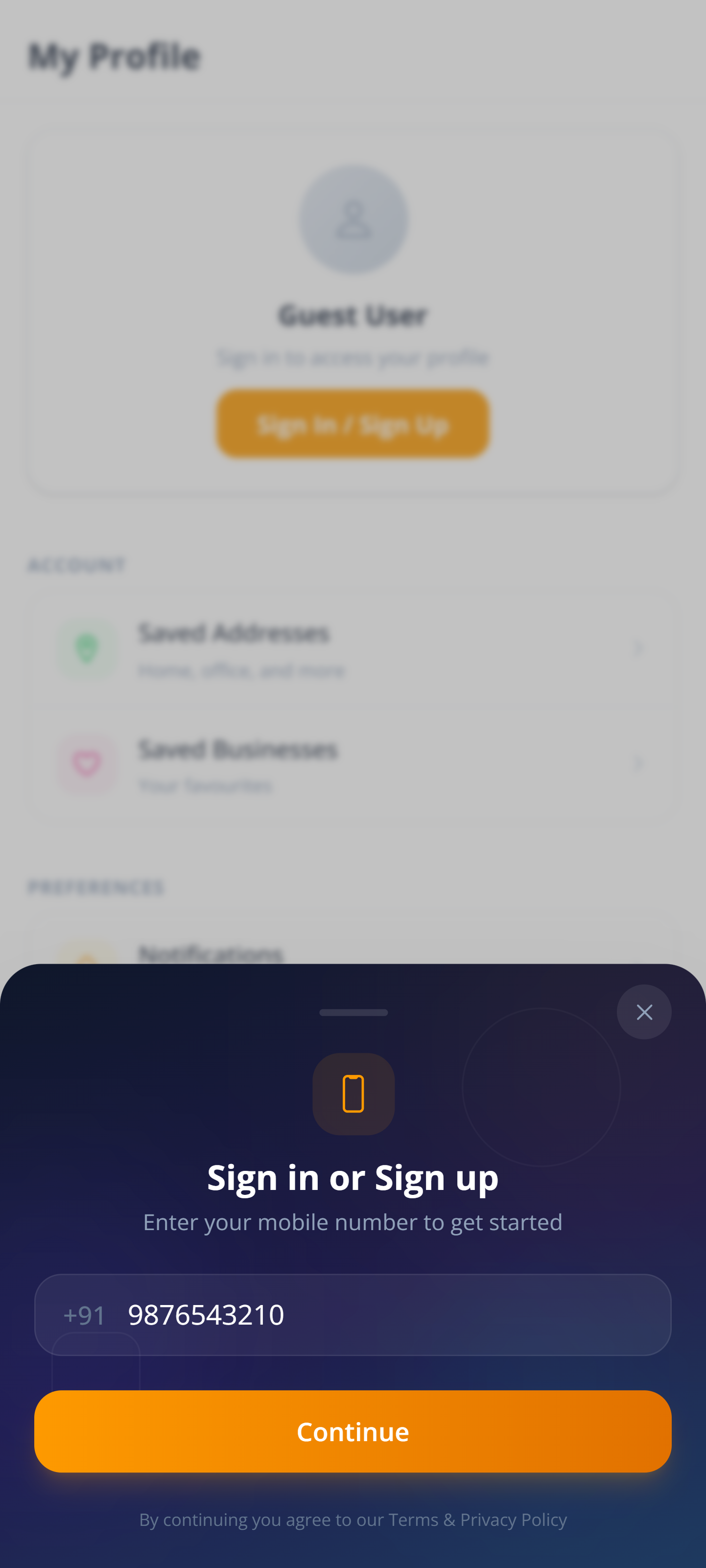 Tijarah sign-in sheet asking for a mobile number, over a blurred guest profile screen